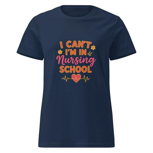 Navy blue t-shirt with colorful text “I CAN'T I'M IN NURSING SCHOOL” design for nursing students.