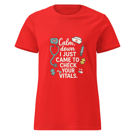 Red t-shirt with the quote Calm Down I Just Came to Check Your Vitals featuring stethoscope, nurse hat, syringe, pills, and puzzle pieces – funny nurse shirt for healthcare workers.